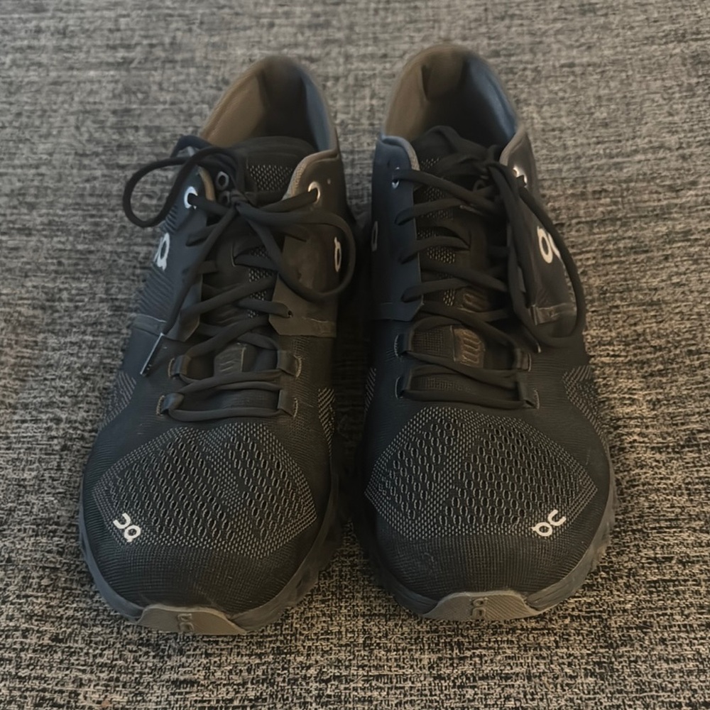 On Running Black and Gray Athletic Shoes with Low-Profile Design